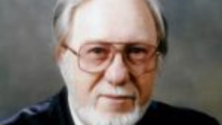 M. Guy Racine (1930-2022)